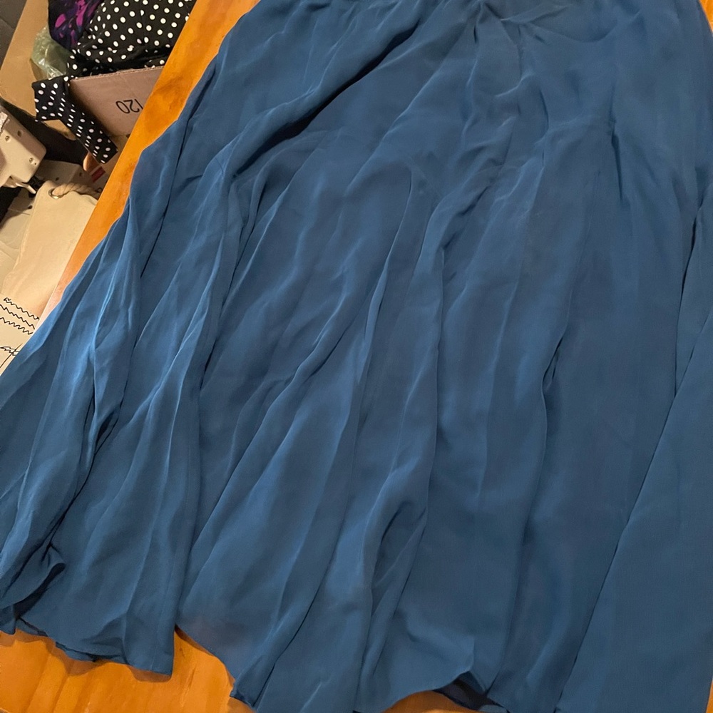 I’m selling a long blue skirt